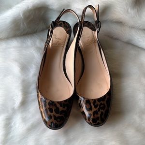 CHRISTIAN LOUBOUTIN
Patent Leather Animal Print Slingback Pumps